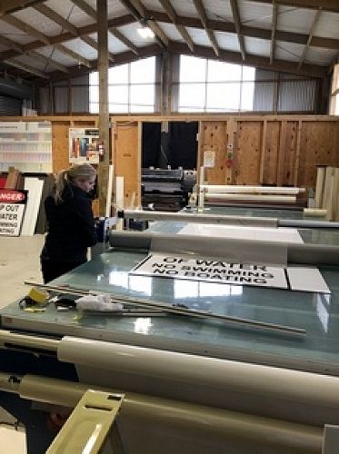Liz working at Geraldine Signs