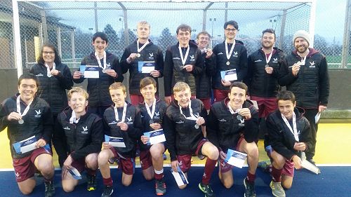 A happy boys hockey team is placed a very close second in the tournament.