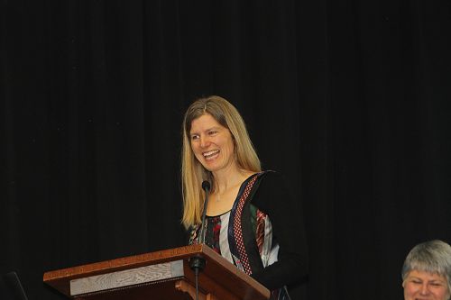 Dr Macleod addresses the school