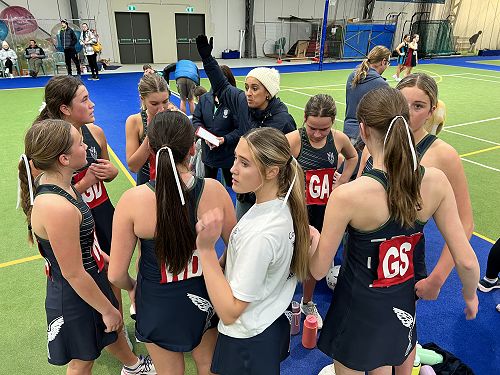 Coach Tara during a break in play