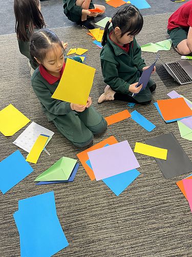 Starting to make our paper stars.