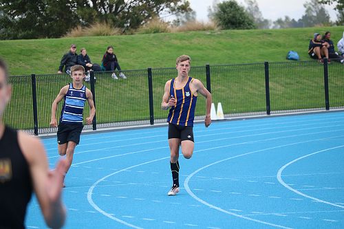 Harrison Laing winning the Under 14 400m