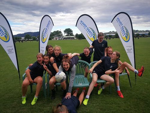 Columba Navy touch team celebrating their win