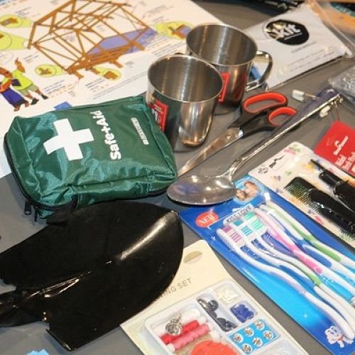 Contents from an Emergency Response Kit on display to show how much gets
packed into the box