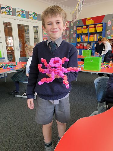 Samuel with the octopus he made