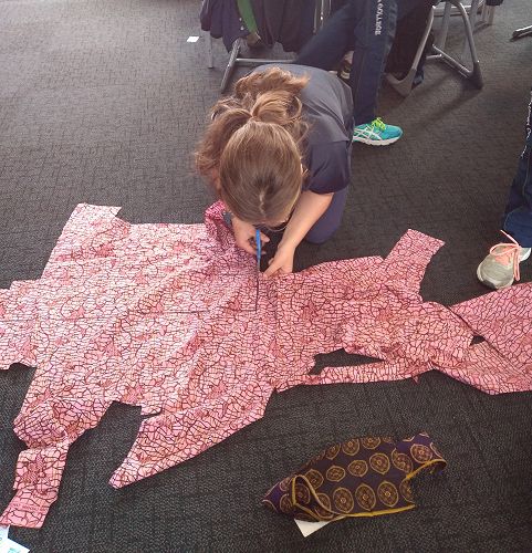 Sophie Butson cutting her fabric