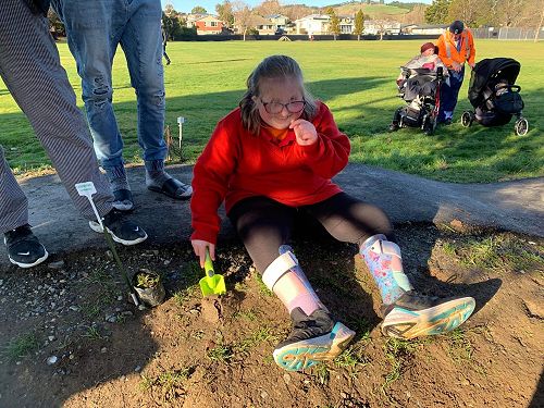 Brooke planting trees