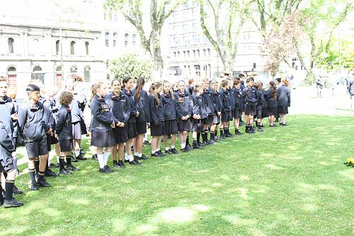 56 children enjoying the Armistice day service.