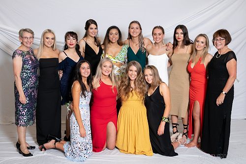 Mrs West and Mrs Riethmaier with senior students at the formal. 