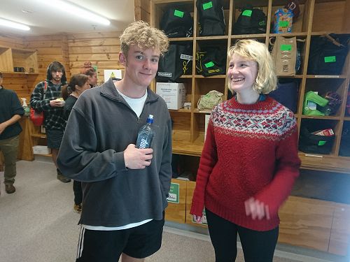 Ever the Johnnies gentlemen Max Walker takes time out to talk to YHA guests from overseas (wary boyfriend in rear of shot)