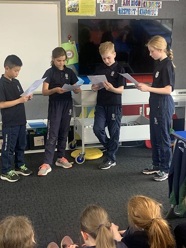 Lucas, Harriet, Leo and Cate performing a play about push and pull factors bringing Chinese Gold Miners to the Otago region