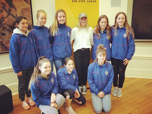 Queen's students with Zoi Sadowski-Synnott