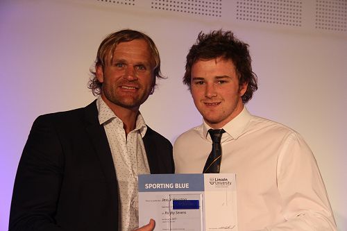 Scott Roberston presents Jesse Houston with his Lincoln University Blue for Rugby Sevens