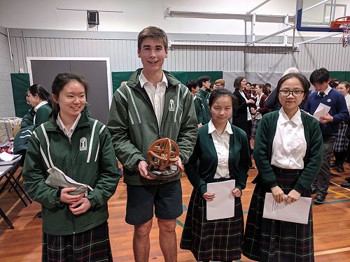 Year 12 Maths Competition winning team: Angie Park 12WSUM, Thomas James 12SDMJ, Angela Guo 12SMDJ, and Aimee Wang 12NHWN.