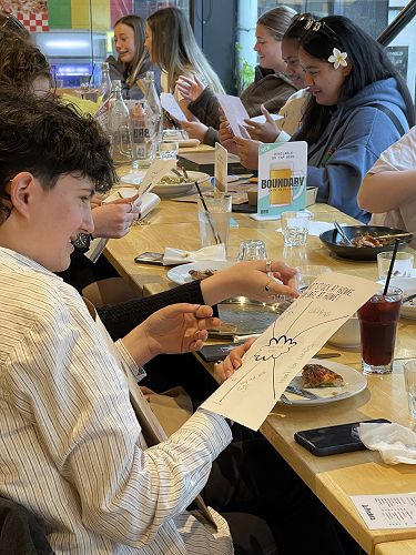 Year 13s reading through their Year 9 time capsules