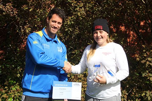 LU Sport Strength and Conditioning coach Hoani Smith presenting Kirtsy Nation with her Lincoln University Blues for Cricket and Hockey