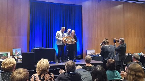 ENL Chief Sales & Marketing Officer presents the Electronic Navigation Shield to Donna Wells (2023)