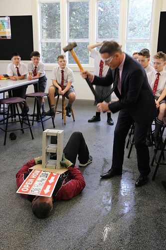 Mr Thelning hammering out some industrial relations with the staff