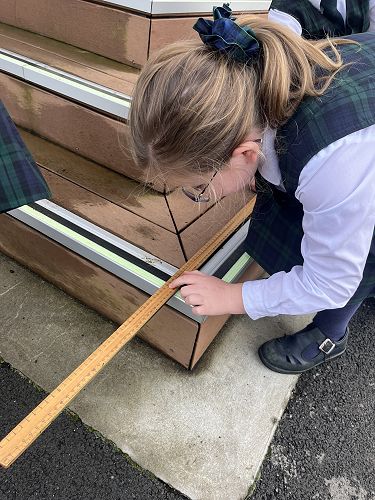 Look! I can measure like a pro with my feet, hands and ruler!