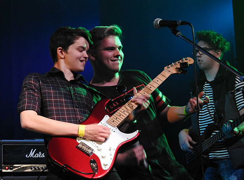 Ben rocks out with bandmate Reece.