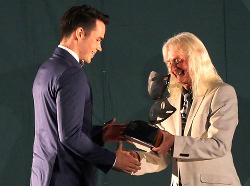 Fergus Chinnery receiving his Drama Award from retiring teacher, Lloyd Smith