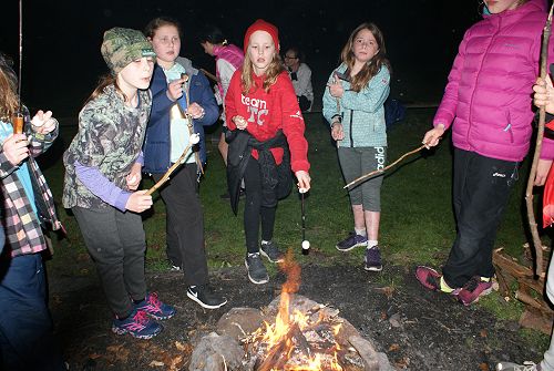 Year 7 campers toast marshmallows