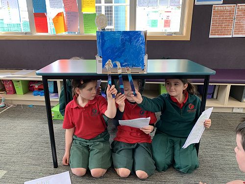 Practising the puppet show.