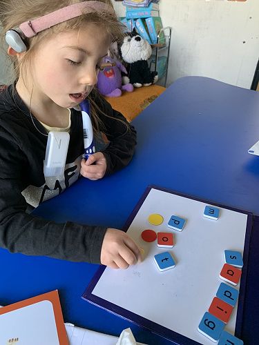 Esme working on her literacy