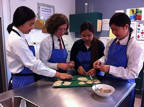 This dumpling making class is being taken by some of our international students.