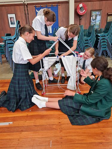 Bella, Ruby, Lucia, Millie, Eivissa put finishing touches on their Puppet Show