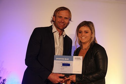 Scott Robertson presents Becky Davidson with her Lincoln University Blue for Rugby Sevens