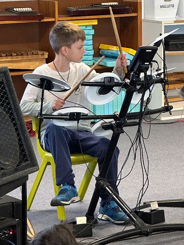 Noah playing "High Hopes / Ho Hey"