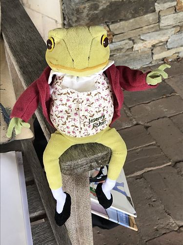 Jeremy Fisher listening to a story