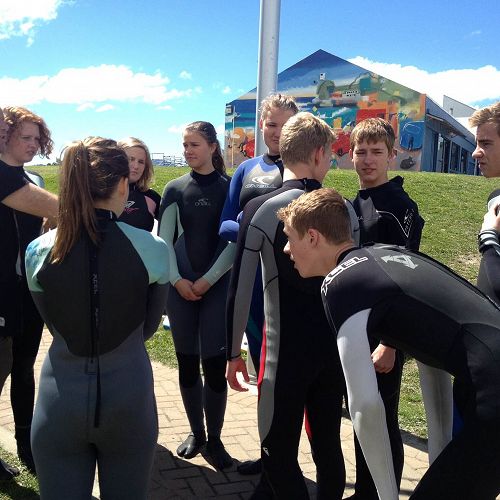 International students surfing