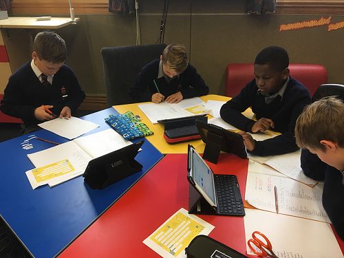 Taking part in Get NZ Writing - Year 7s constructing their poems to send to our buddy school in Cambridge