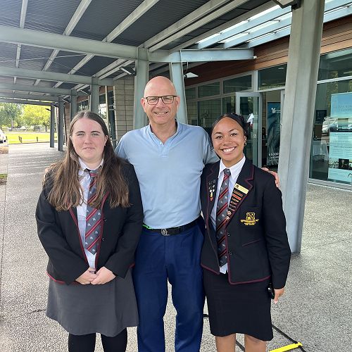 Katelyn and Sina with the police offer assisting for the day