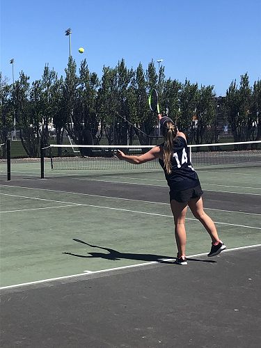Bethany Nicholson displays her serving skill