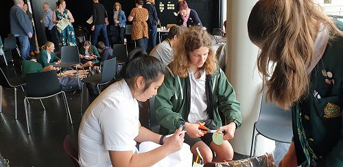 Victoria and Isolde working on their prototype solution.