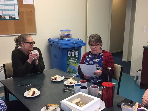 Dominique supervising the Reading of a Poem at Morning Tea