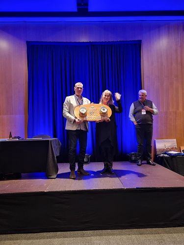 ENL Chief Sales & Marketing Officer presents the Electronic Navigation Shield to Donna Wells (2023)