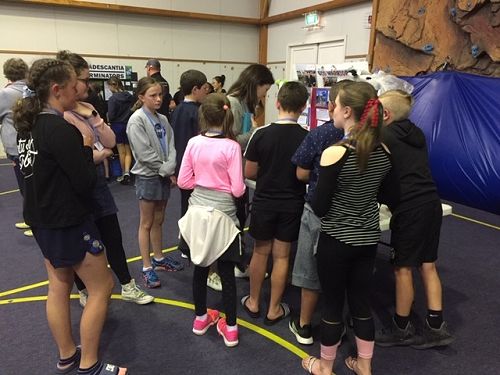 Other teams checking out our display.