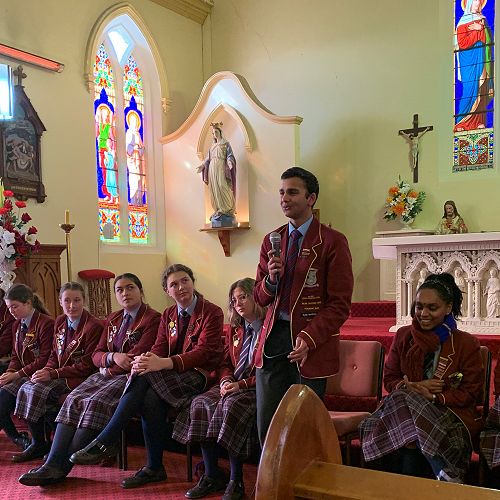 Year 13 Dhru Shah talking to our young leaders