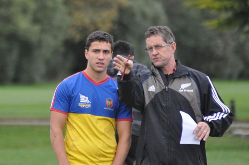 Warwick Taylor gives some advice to IRP player Leo Ceccarelli.