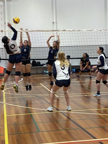 Brianna Horne sending the ball back over the net