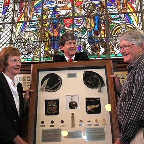 Bill and Trish Lindsay present D F Lindsay’s rugby memorabilia to the school in 2009