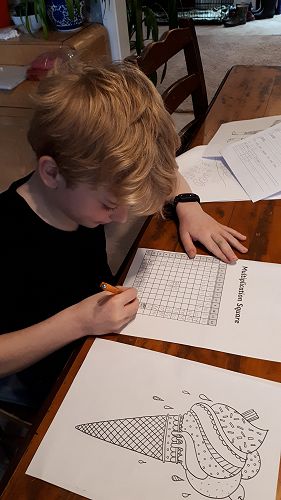 Leo enjoying some extra Mathematics time.