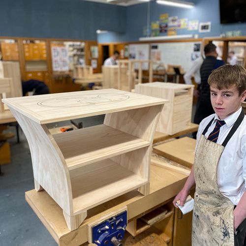 Sam with his woodwork project