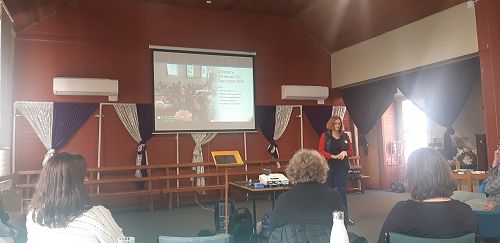 Julanne Clarke-Morris sharing about the Christmas Fun Day