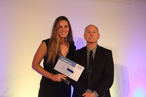 Davina Waddy receiving her Lincoln University Blue for Rowing from the Chief Academic Officer Professor Bruce McKenzie
