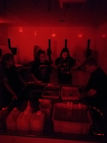 Mr Wootton works his darkroom magic for Amber and Charlotte.